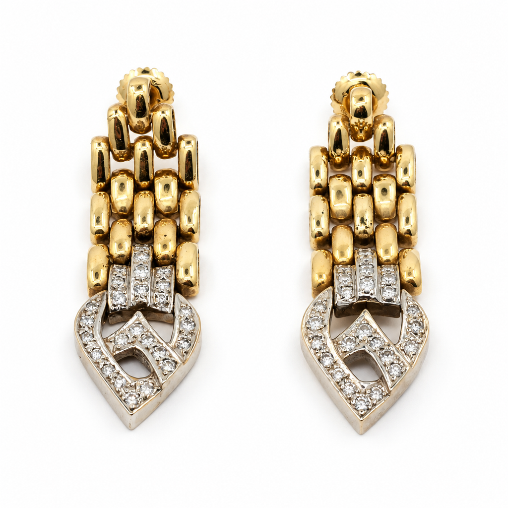 Front view of articulated gold earrings with diamond-set drops